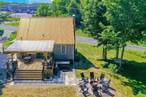 Aerial view of Copper Top Ridge, a New Buffalo vacation rental with private patio, hot tub, pergola, and fire pit