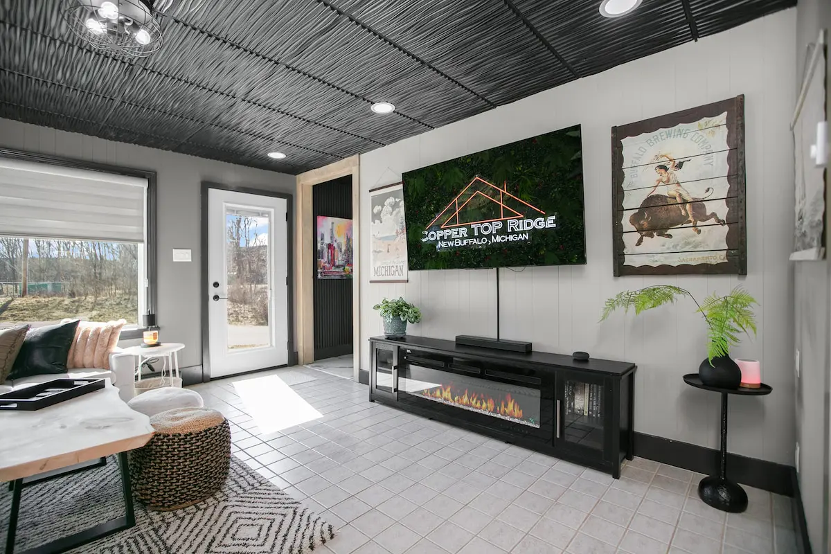 Cozy living room with fireplace and large windows