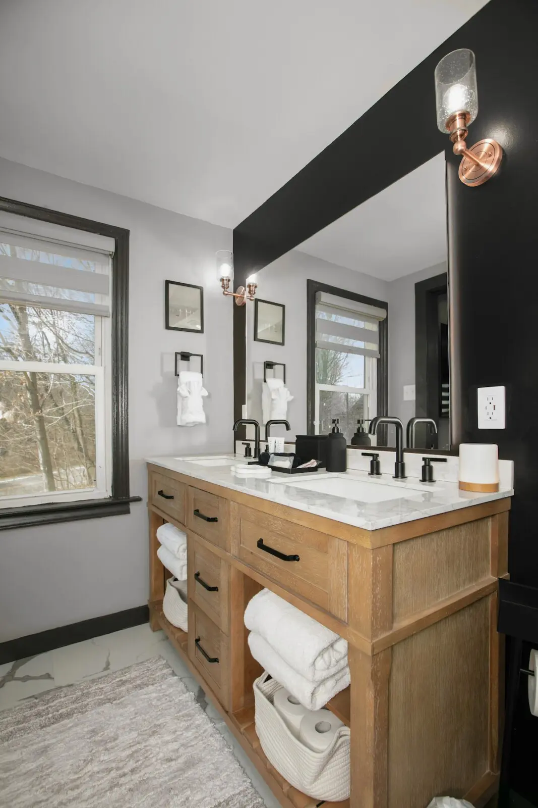 Flat screen TV and fireplace in cozy Lake Erie Room