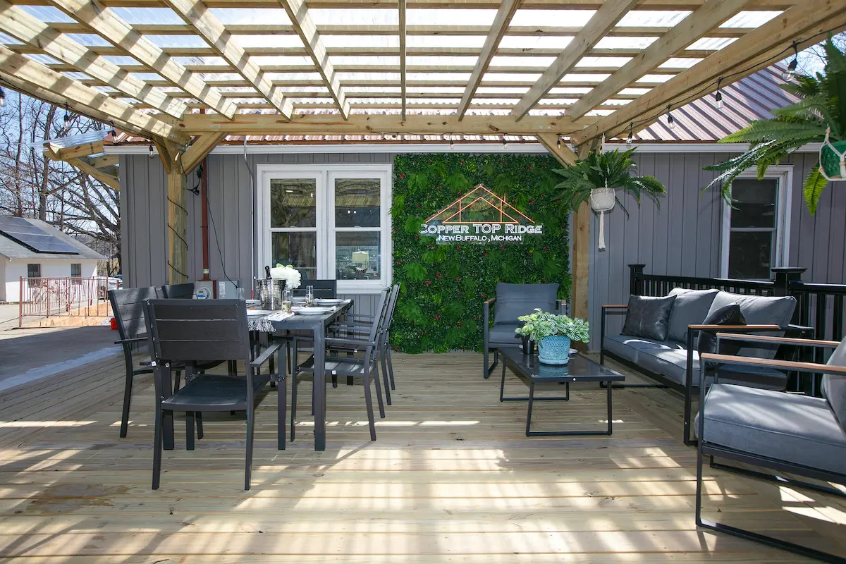 Backyard fire pit with Adirondack chairs