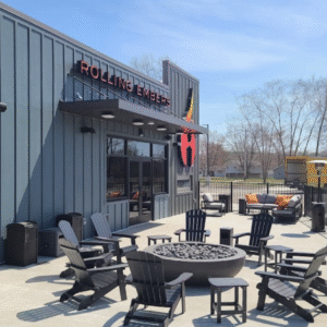 Rolling Embers New Buffalo – Outdoor Lounge Patio Outdoor patio at Rolling Embers in New Buffalo featuring Adirondack seating and a fire pit beside the tribal-owned cannabis lounge