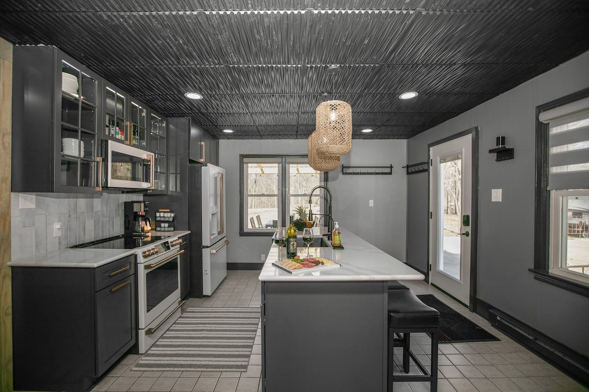 Cozy living room with large TV and fireplace