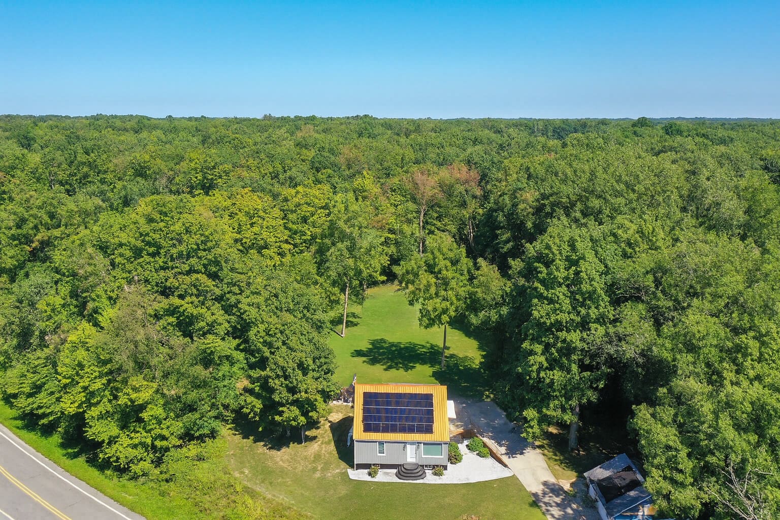 Aerial view of Copper Top Ridge surrounded by forest in New Buffalo, Michigan — contact Copper Top Ridge for reservations and guest inquiries.