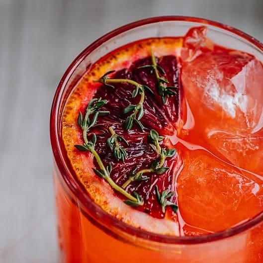 The False Front Bar | Things to Do in Southwest Michigan: Cozy speakeasy-style bar with craft cocktails and moody lighting in downtown New Buffalo.