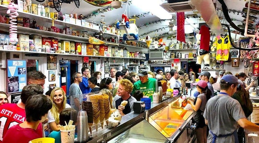 Oink’s Dutch Treat | Things to Do in Southwest Michigan: Ice cream cones and pig-themed décor inside a colorful New Buffalo shop.