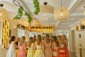 A group of women enjoying a wine tasting inside Solasta Winery near New Buffalo, one of the best wineries and tasting rooms near New Buffalo.