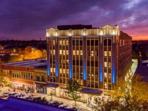 Uptown Arts District in Michigan City with colorful murals and historic brick storefronts